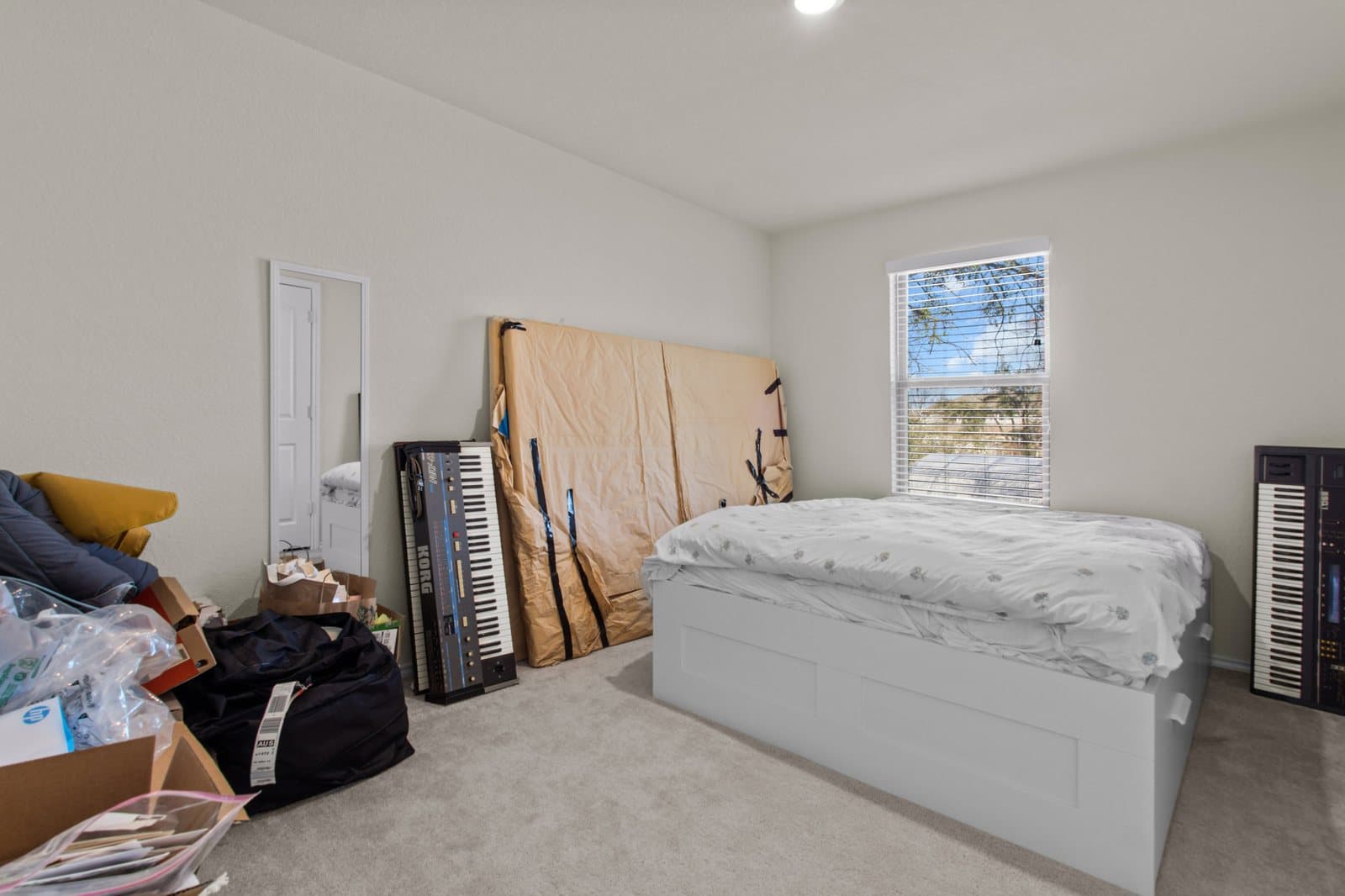 Cluttered bedroom as photographed
